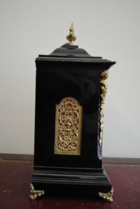 8 day 'Ting Tang' striking bracket clock by Wintermeier & Hoffmeier Ebonized wooden case with gilt brass spandrels on door side